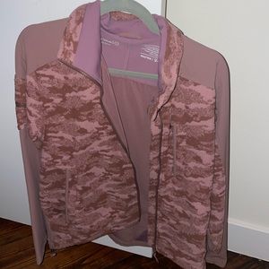 Brand new outdoor voices zip up jacket runs large